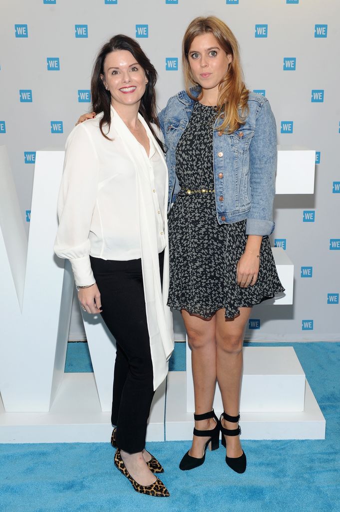 Princess Beatrice in a black mini dress and denim jacket