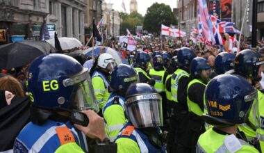 Police and protesters scuffle as 110,000 join anti-migrant London protest