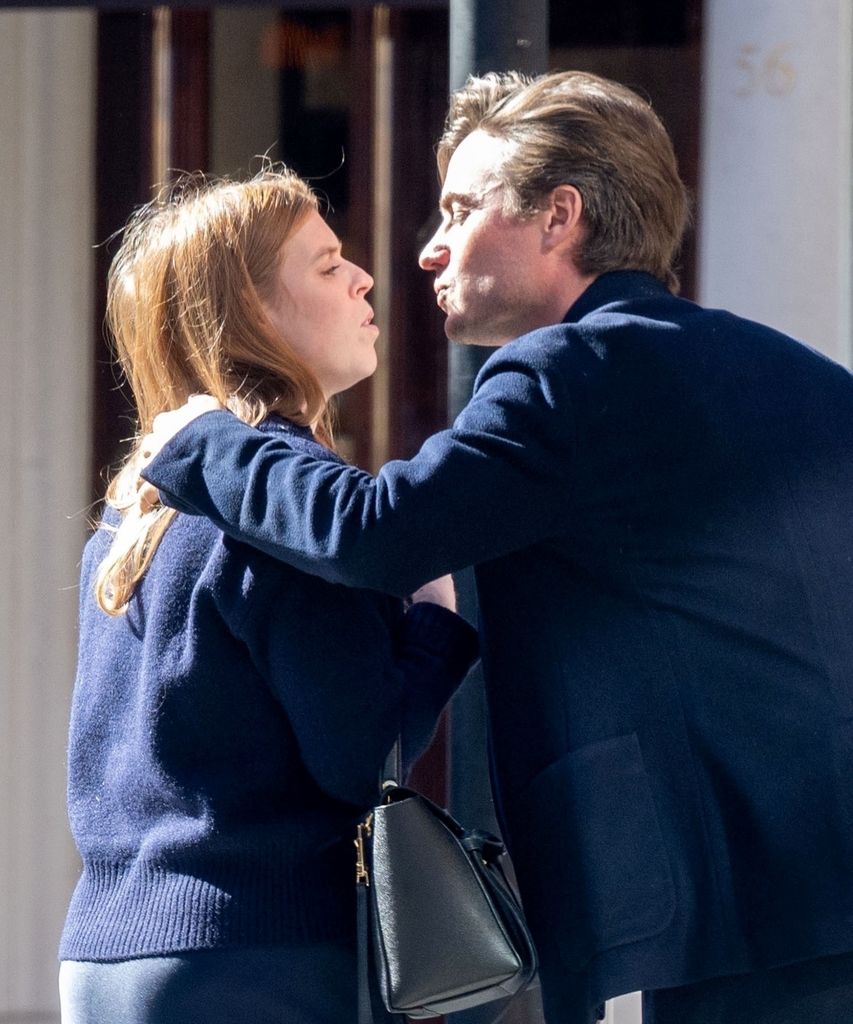 Princess Beatrice kisses Edoardo Mapelli Mozzi as they leave Scotts in Mayfair