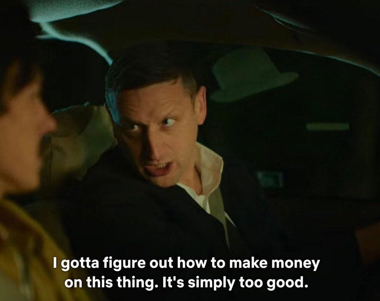 Charlie’s Wife selling merch at his funeral service