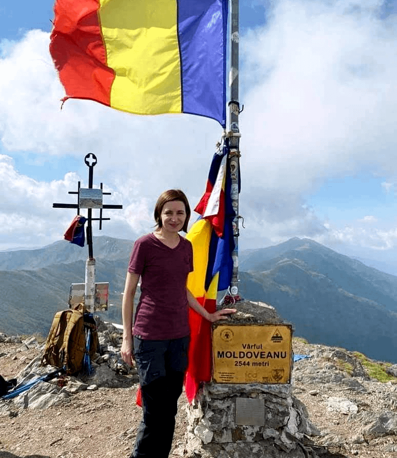 Maia Sandu, president of Moldova, atop the highest mountain in Romania, Moldoveanu (the Moldavian).