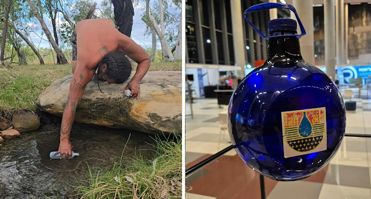 Bottles of 500,000-year-old water flown from outback site amid furious dispute