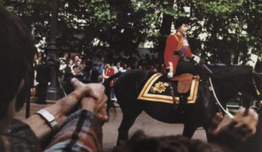 Queen Elizabeth II at the moment when Marcus Sarjeant is preparing to fire six blank shots in her direction. United Kingdom, 1981.