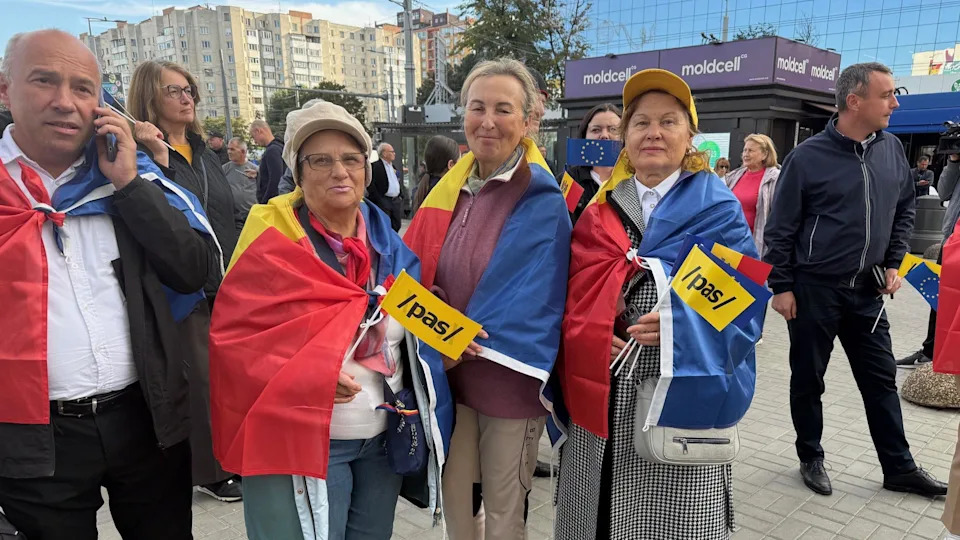 Protesters with signs in Chisinau