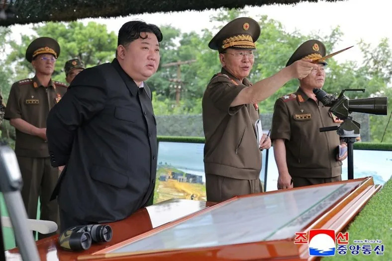 North Korean Supreme Leader Kim Jong Un, second from left, has tightened restrictions on North Koreans, who are being executed for watching foreign films and television shows, the United Nations reported on Friday. Photo by KCNA/EPA