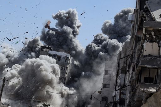Israel kills nearly 100 Palestinians in attacks across Gaza