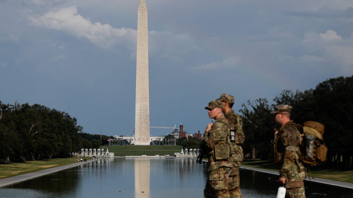 Gold statue of Donald Trump holding a Bitcoin went up in DC. Why?