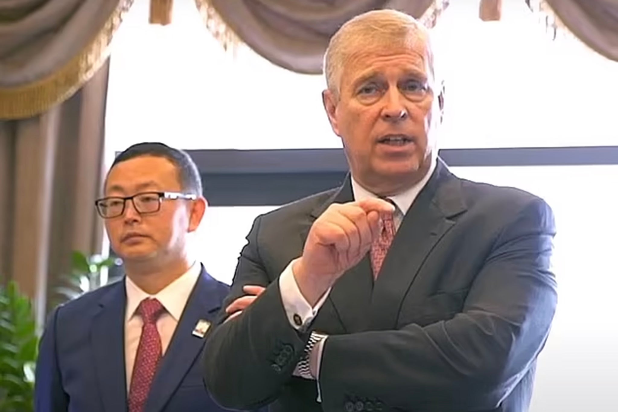 Alleged Chinese spy Yang Tengbo with and Prince Andrew