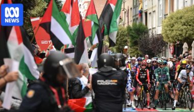 Riders threaten to quit Vuelta a España as organisers cut time trial stage short for safety reasons