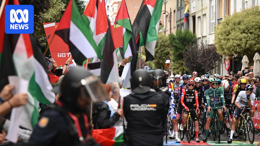 Riders threaten to quit Vuelta a España as organisers cut time trial stage short for safety reasons