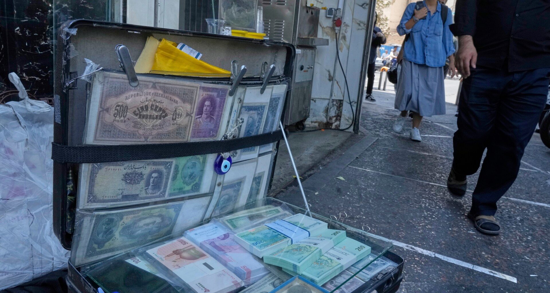 Iran’s currency hits new low as ‘snapback’ looms over nuclear programme | Politics News