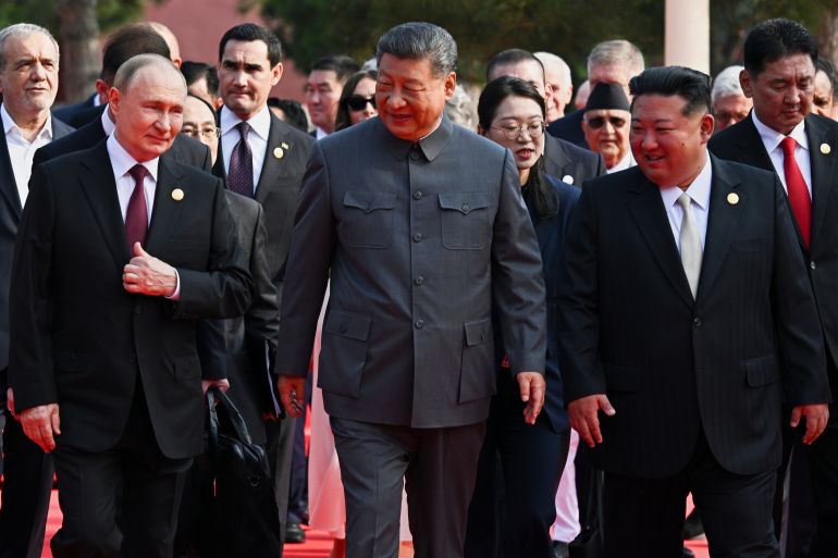 Front from left, Russian President Vladimir Putin, Chinese President Xi Jinping and North Korean leader Kim Jong Un arrive at a military parade to commemorate the 80th anniversary of Japan's World War II surrender in Beijing, China, Wednesday, Sept. 3, 2025. (Sergei Bobylev, Sputnik, Kremlin Pool Photo via AP)