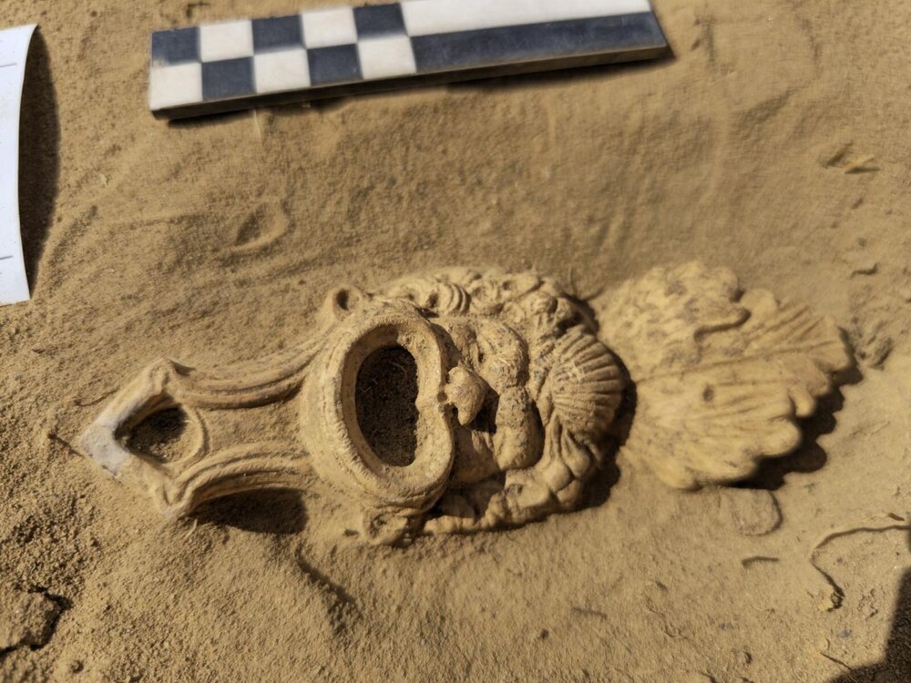 The Roman mask-decorated oil lamp found in Cuijk. Credit: Gemeente Land van Cuijk