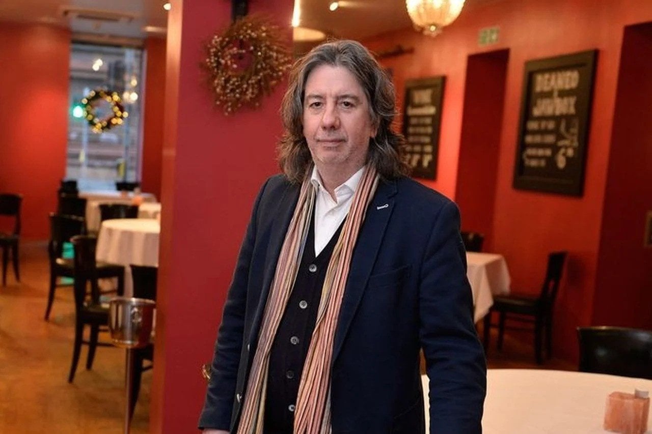Belfast restaurateur Michael Deane apologises after criticism of social media post over migrant workers