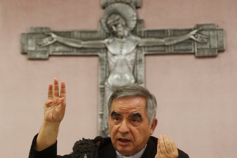 FILE — Cardinal Angelo Becciu talks to journalists during news conference in Rome, Sept. 25, 2020. (AP Photo/Gregorio Borgia, File)