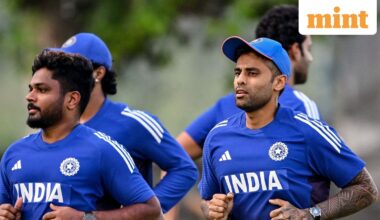 India's captain Suryakumar Yadav (R) and Sanju Samson attend a practice session at the International Cricket Council (ICC) Academy in Dubai. (Photo by Sajjad HUSSAIN / AFP)