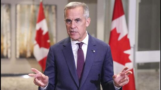 Canada's Prime Minister Mark Carney speaks during a media availability at the Liberal Cabinet Retreat in Toronto, on Wednesday. (AP)