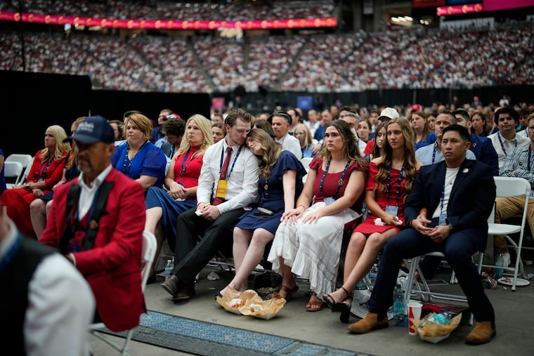 Mourners listen as Erika Kirk speaks at a memorial for her late husband conservative activist Charlie Kirk on Sunday, Sept. 21 at State Farm Stadium in Glendale, Ariz.
