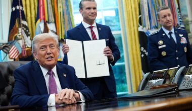 President Donald Trump speaks to the media after signing an executive order renaming the Department of Defense the Department of War as Defense Secretary Pete Hegseth and Chairman of the Joint Chiefs of Staff Air Force Gen. Dan Caine (R) look on in the Oval Office on Sept. 5, 2025. (Kevin Dietsch/Getty Images)