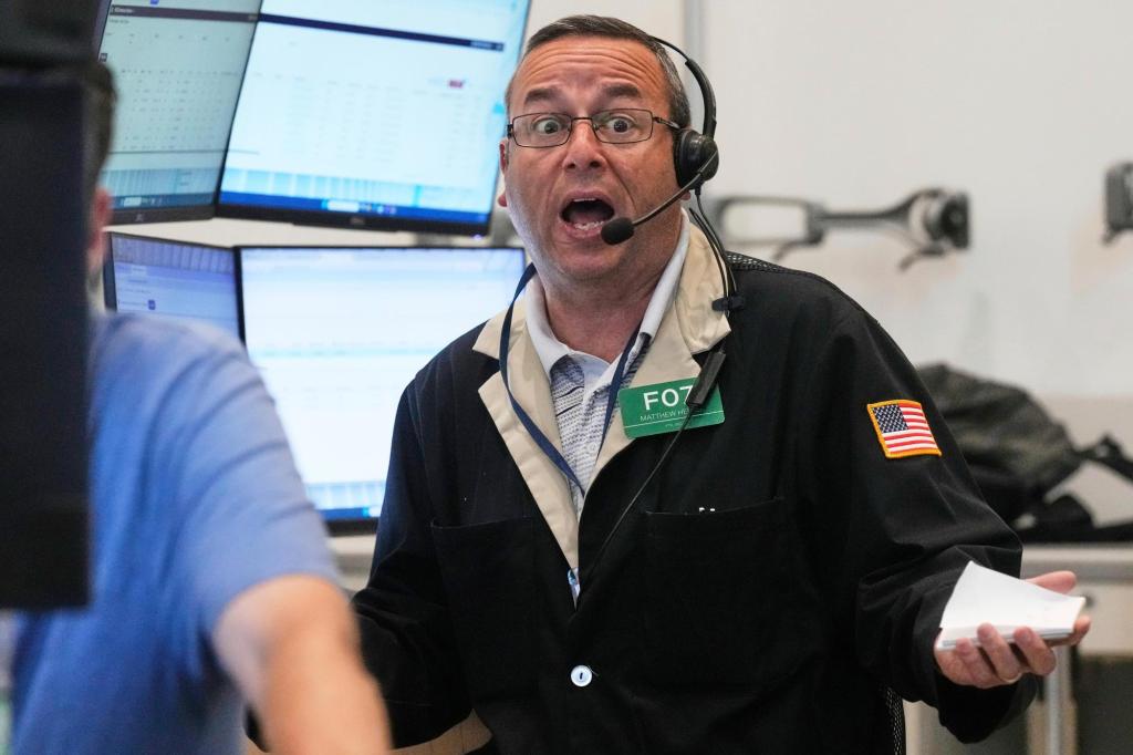 Stocks tick higher as Wall Street drifts near its record levels