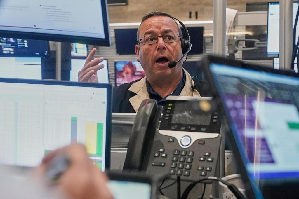 Wall Street pulls further from records under pressure of bond market