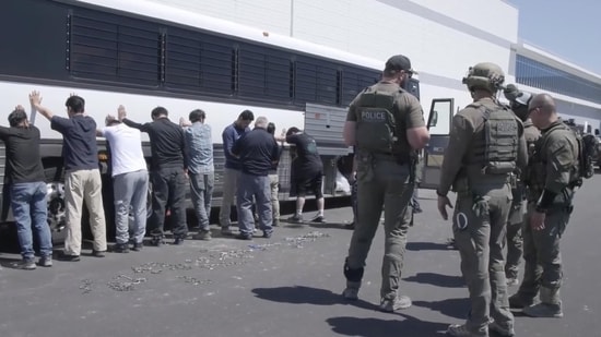 Around 475 workers were taken into custody from the Georgia plant, over 300 of them were South Korean nationals.(AP) Around 475 workers were taken into custody from the Georgia plant, over 300 of them were South Korean nationals.(AP)