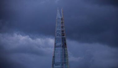 LONDON, UNITED KINGDOM - 2021/08/06: Dark clouds gather over The Shard building in London as more rain falls in the capital. (Photo by Vuk Valcic/SOPA Images/LightRocket via Getty Images)