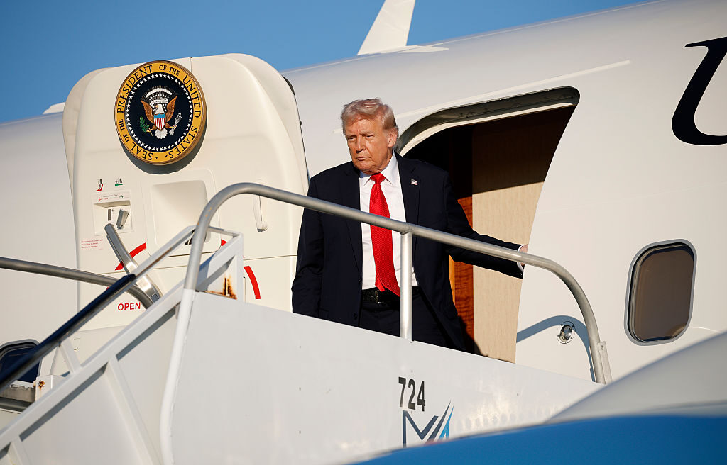 President Donald Trump exits Air Force One on Thursday as he arrives at LaGuardia Airport in New York City. (Kevin Dietsch/Getty Images)