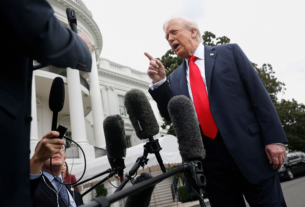 President Donald Trump speaks to reporters Tuesday as he departs the White House en route to London.