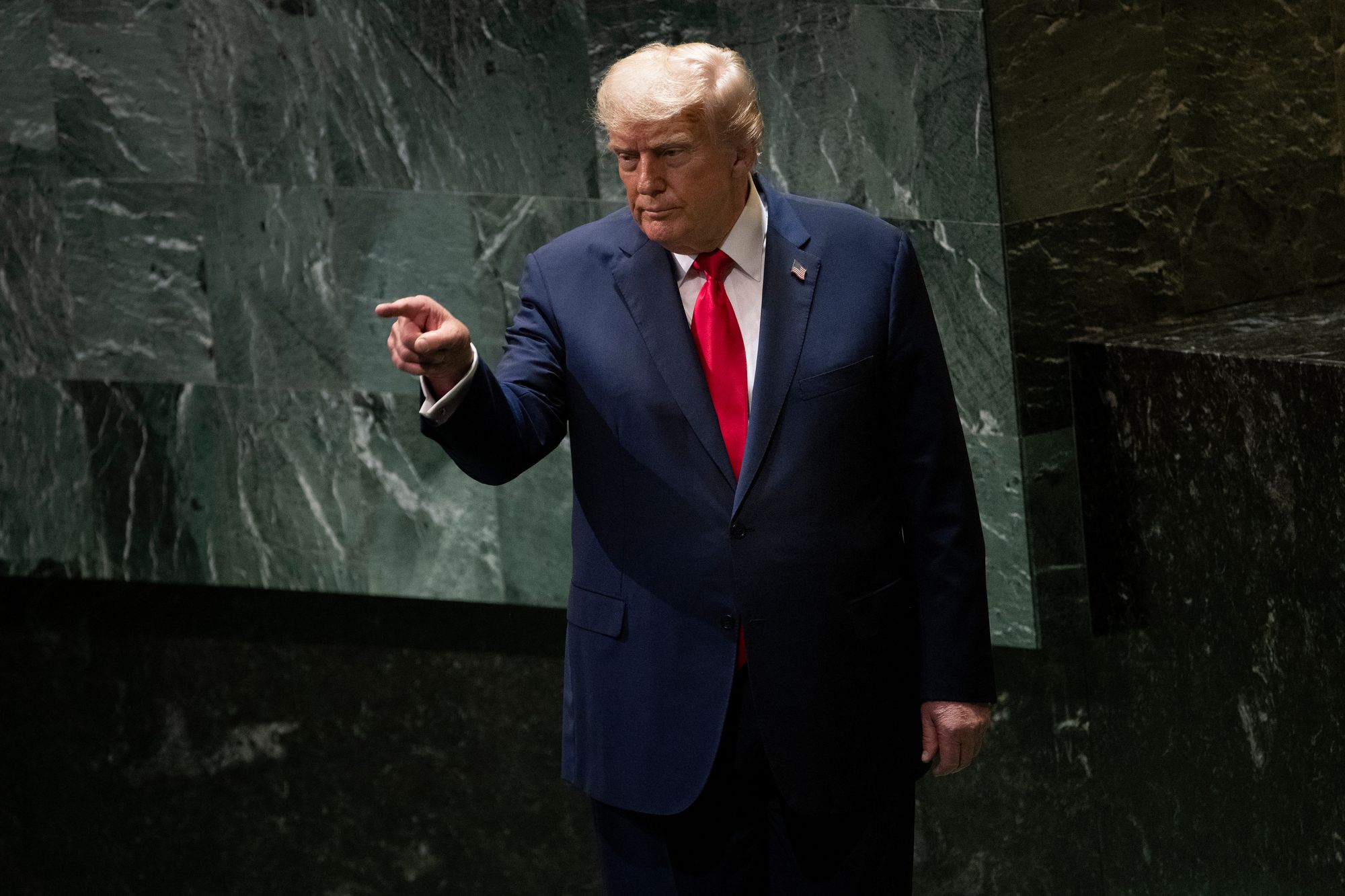 US president Donald Trump points to attendees after delivering remarks to the United Nations General Assembly at the UN headquarters in New York City