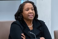 FILE - Federal Reserve Board of Governors member Lisa Cook listens during an open meeting of...