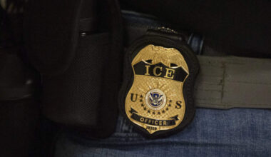 A federal agent wears a badge of Immigration and Customs Enforcement in New York, Tuesday, June 10, 2025. (Yuki Iwamura/AP)