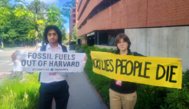 Eshaan Vakil (left), an organizer with Climate Defiance, and Barbara Sheehan, with Sunrise Movement, are two of the activists who disrupted a panel discussion with Occidental Petroleum CEO Vicki Hollub at a Harvard climate symposium on Friday. Credit: Phil McKenna/Inside Climate News