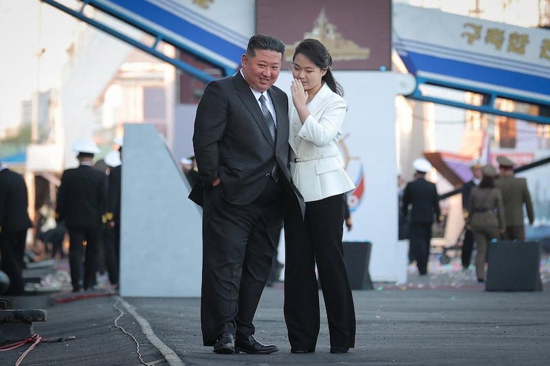 North Korean leader Kim Jong Un and daughter Kim Ju Ae at an event launching a "new multipurpose destroyer," in this North Korean government photo, April 26, 2025.