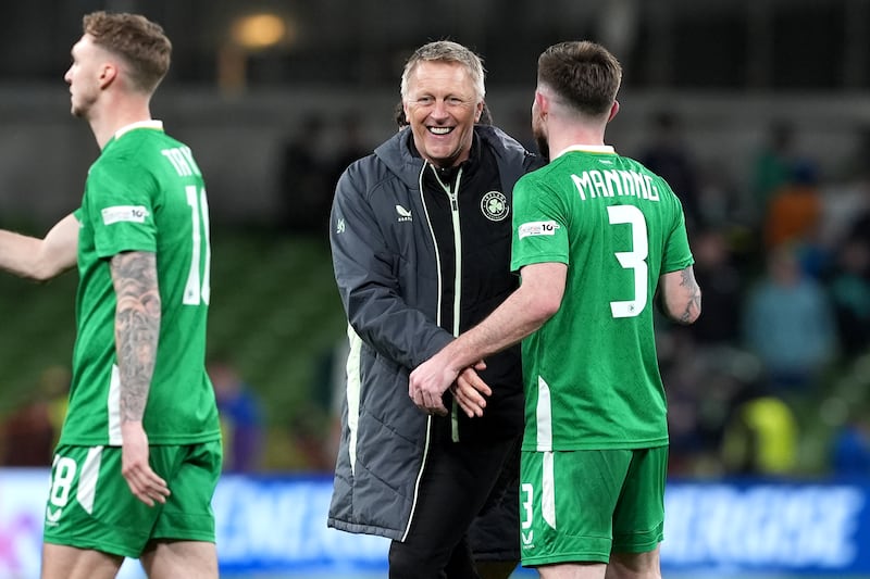 Republic of Ireland head coach Heimir Hallgrimsson celebrates with player Ryan Manning. Photograph: Brian Lawless/PA