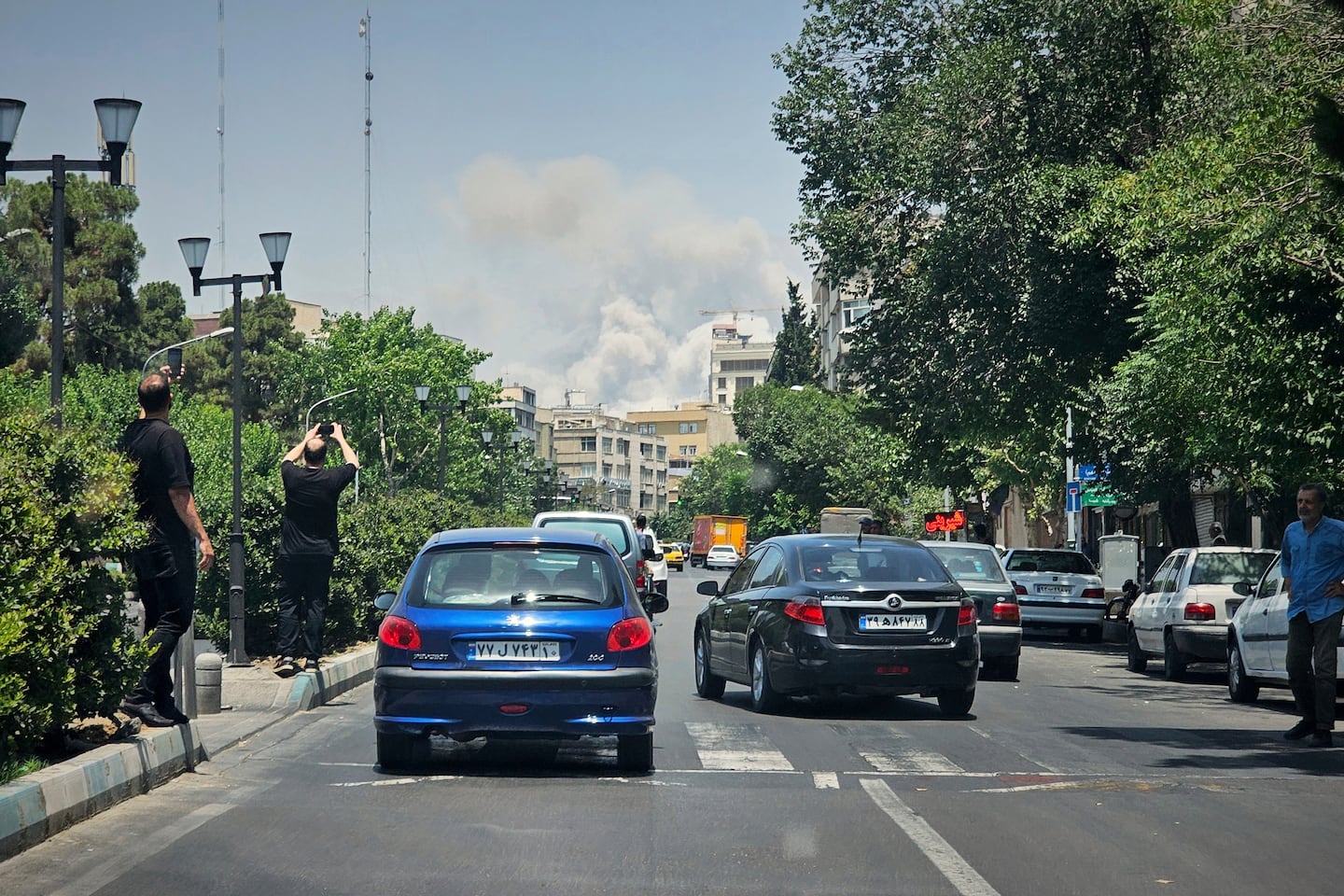 On June 23, residents recorded smoke rising from an Israeli strike in Tehran.