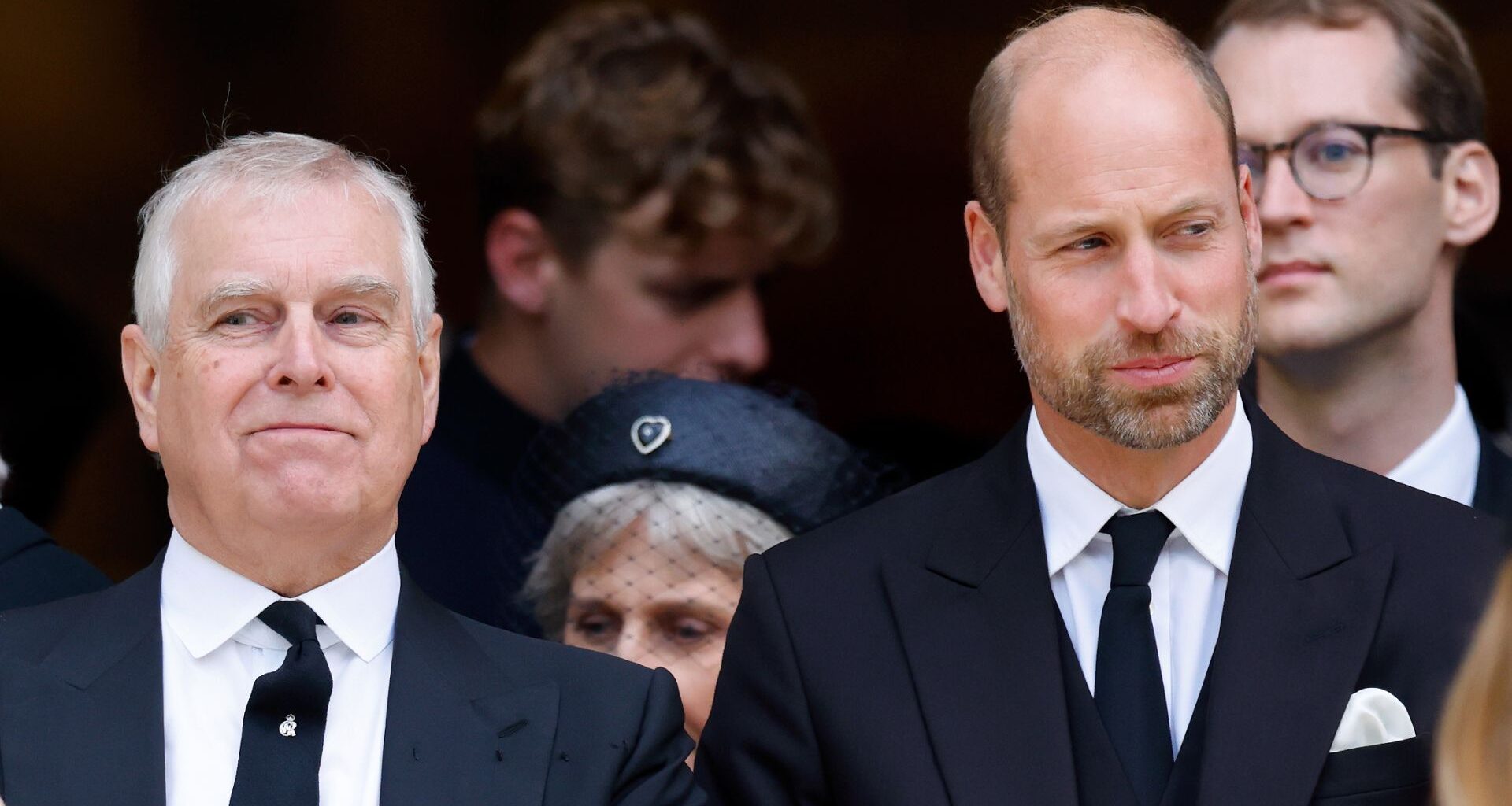 Prince Andrew and Prince William both wear black suits to attend a funeral