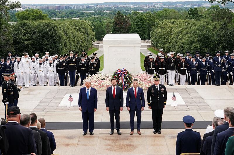 Donald Trump, JD Vance, Pete Hegseth and Major General Trevor J. Bredenkamp stand near the Tomb of the Unknown Soldier.