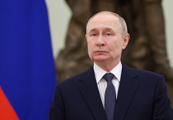 Russian President Vladimir Putin waits for the arrival of Belarusian President Alexander Lukashenko before their meeting at the Kremlin in Moscow, Russia, Friday, Sept. 26, 2025. (Ramil Sitdikov/Pool Photo via AP)