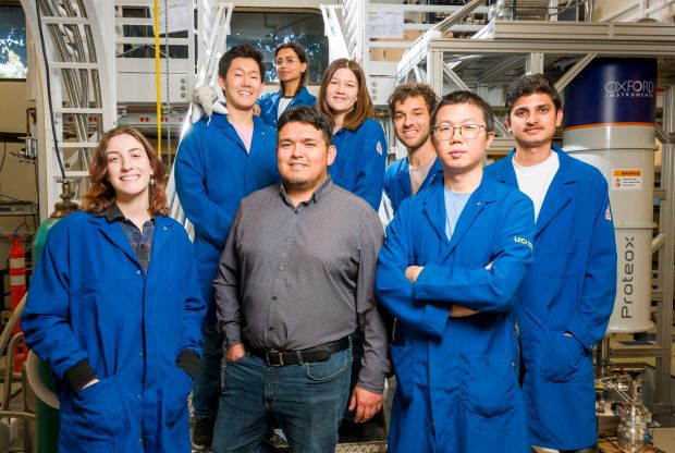 Professor Luis Jauregui, center, director of the Quantum Materials and...