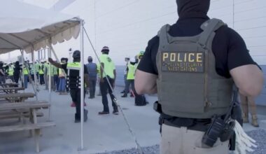 Manufacturing plant employees being escorted outside the Hyundai Motor Group’s electric vehicle plant, Thursday, Sept. 4, 2025, in Ellabell, Ga.