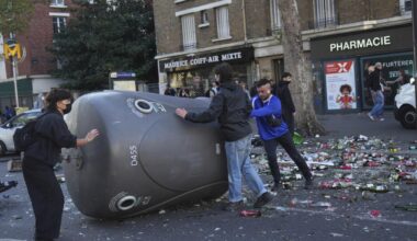 Protesters block roads and set blazes in France amid police tear gas
