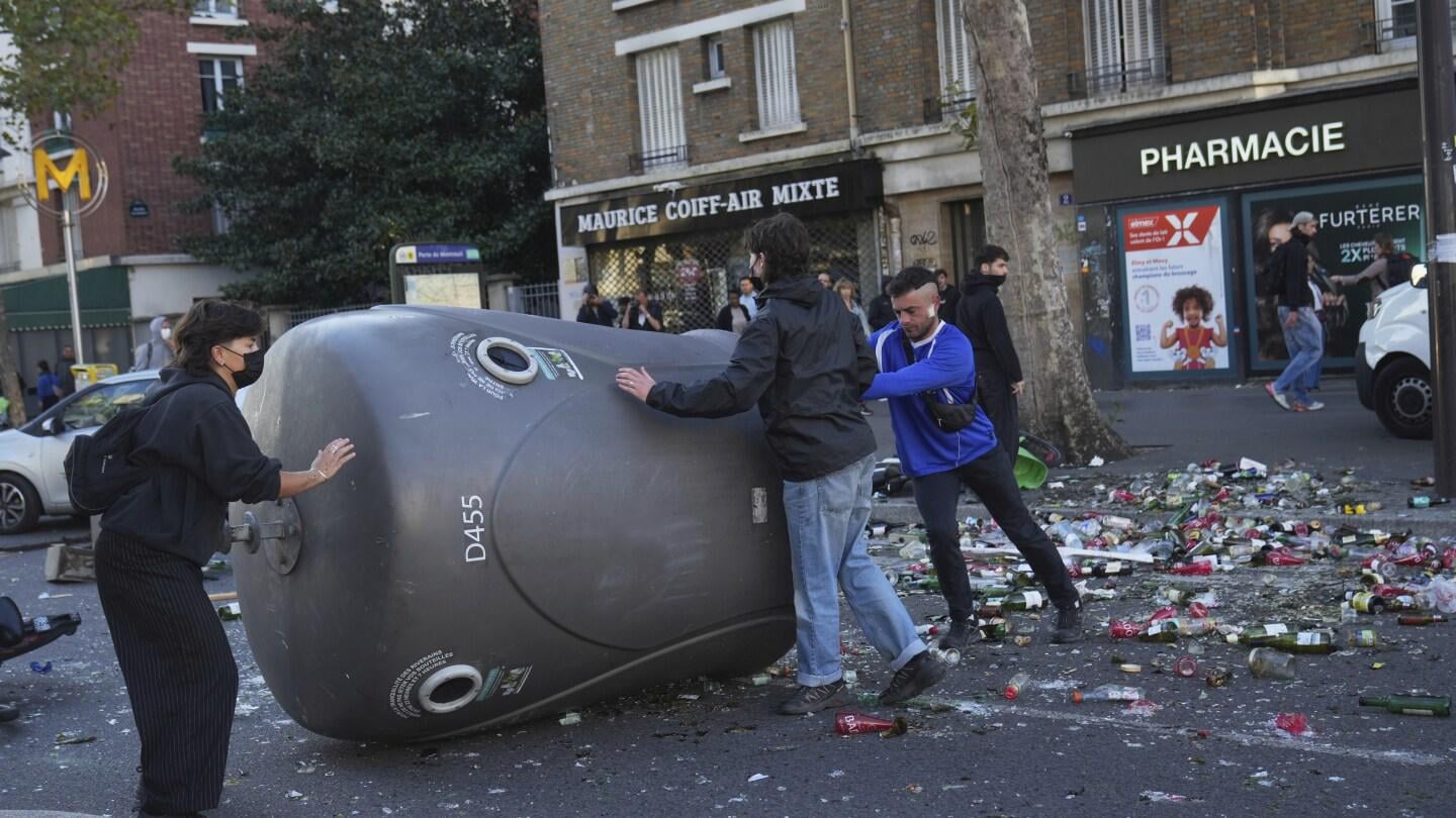 Protesters block roads and set blazes in France amid police tear gas