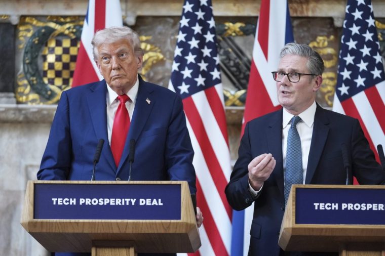 President Donald Trump listens as Britain's Prime Minister Keir Starmer answers questions during a joint press conference at Chequers near Aylesbury, England, Thursday, Sept. 18, 2025. (AP Photo/Evan Vucci)