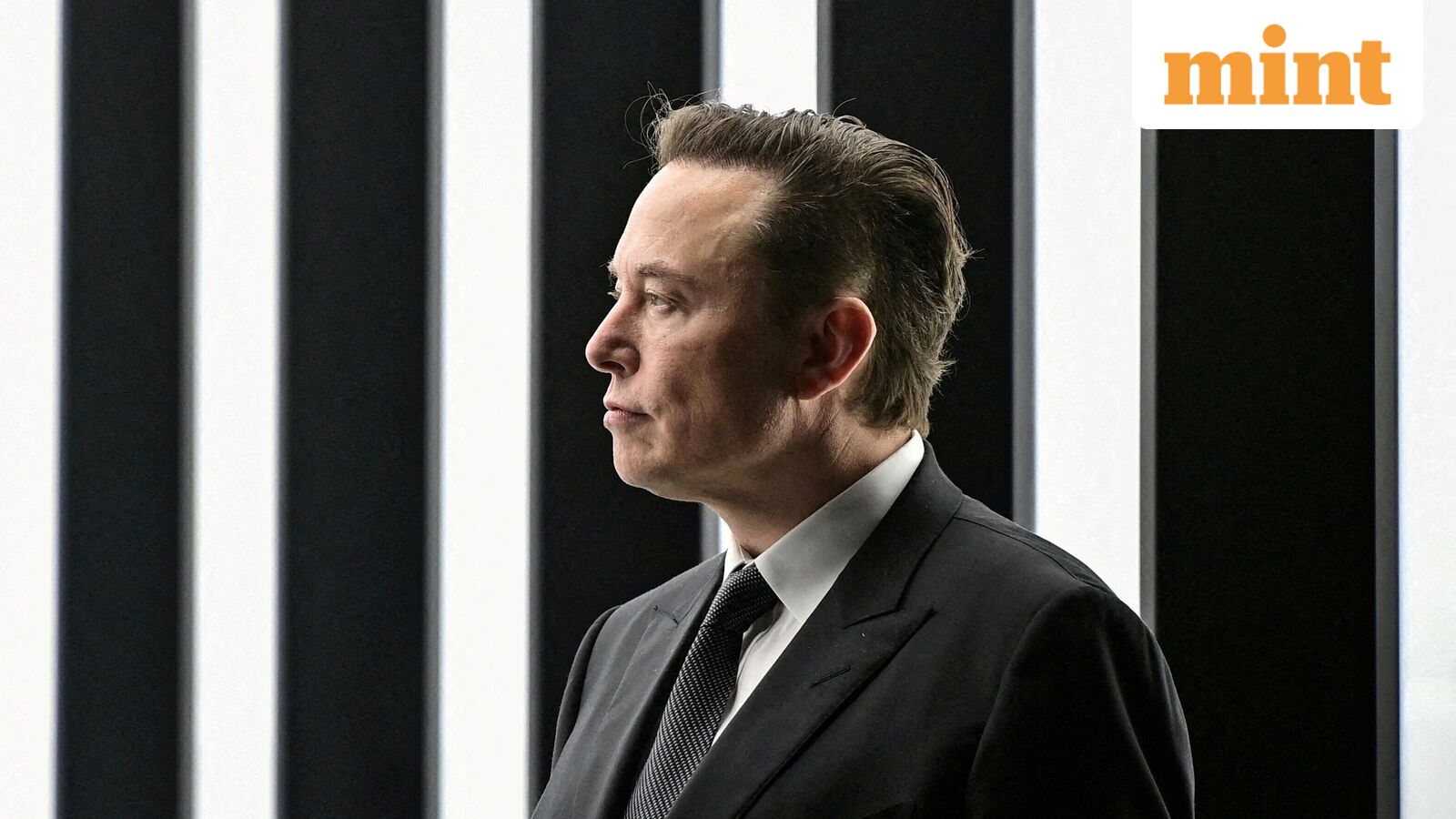FILE PHOTO: Elon Musk attends the opening ceremony of the new Tesla Gigafactory for electric cars in Gruenheide, Germany, March 22, 2022. Patrick Pleul/Pool via REUTERS/File Photo