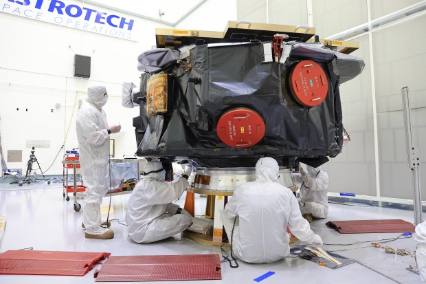Technicians conduct blanket closeout work on NASA's IMAP (Interstellar Mapping...