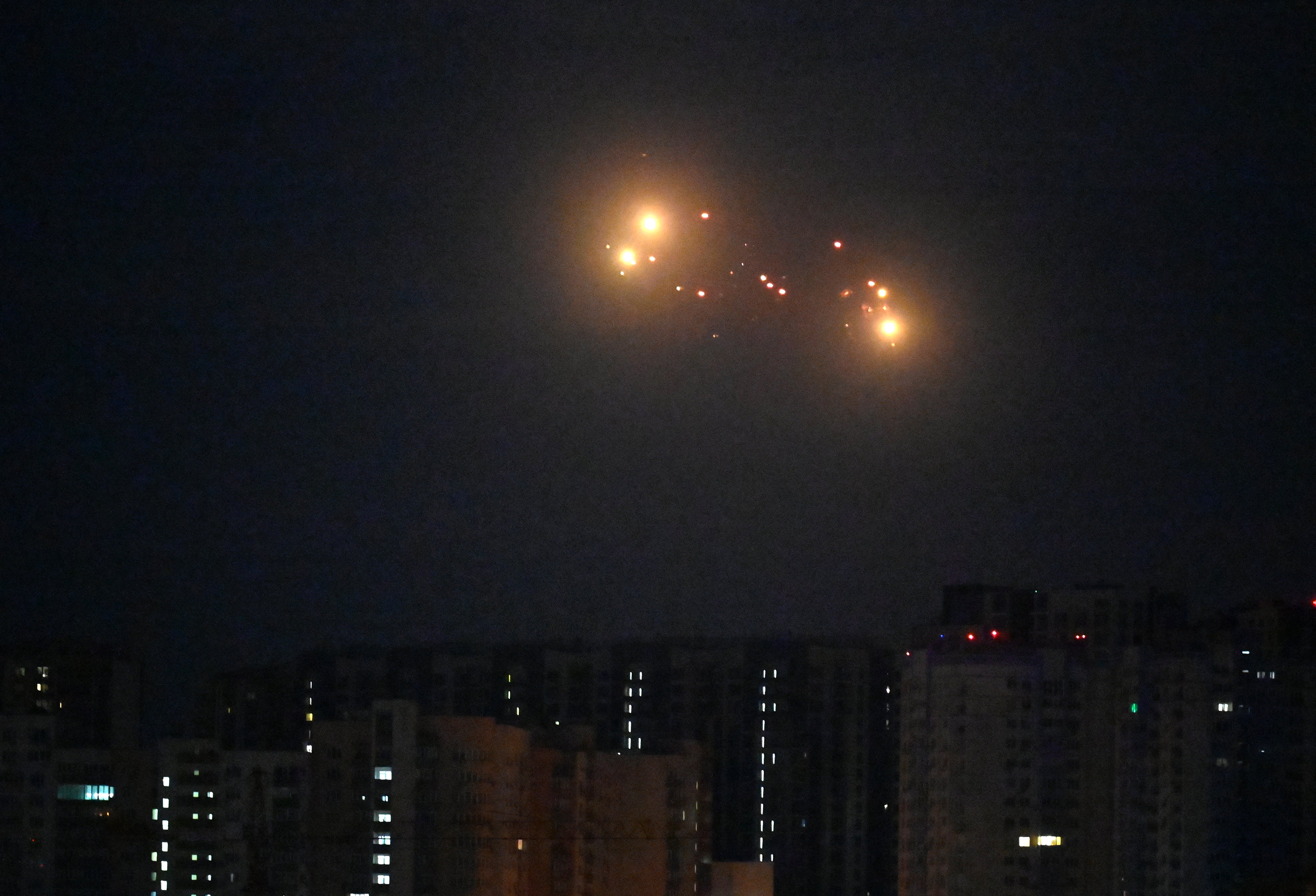 The Ukrainian air defence fires at Russian drones above Kyiv during night mass drone and missile strikes on Ukraine
