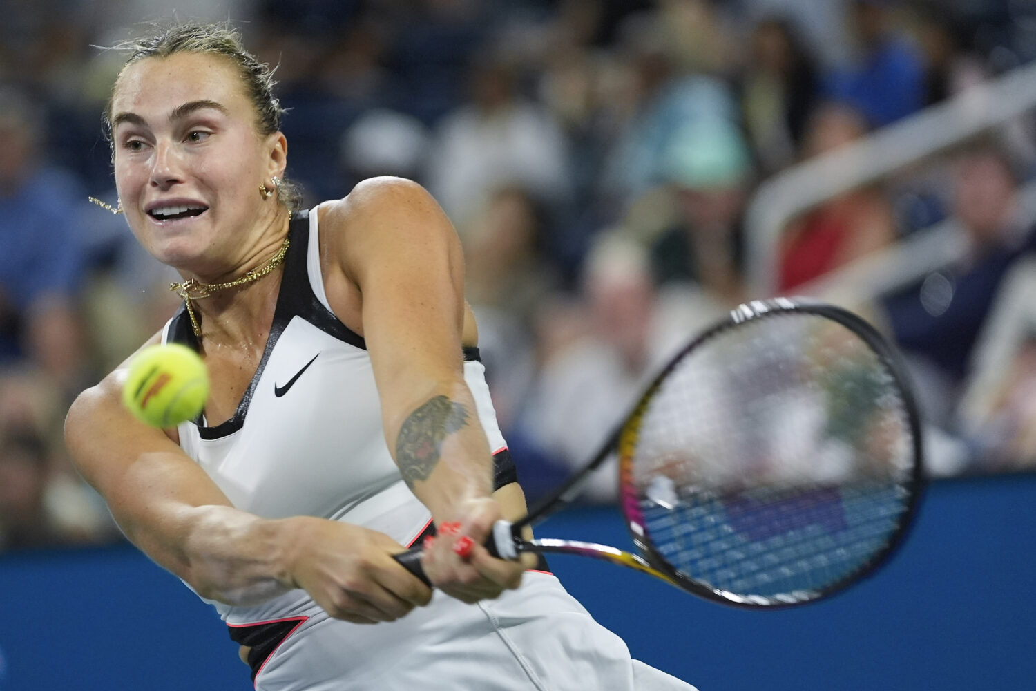 Aryna Sabalenka, of Belarus, returns a shot to Cristina Bucsa, of Spain, during the fourth round of...