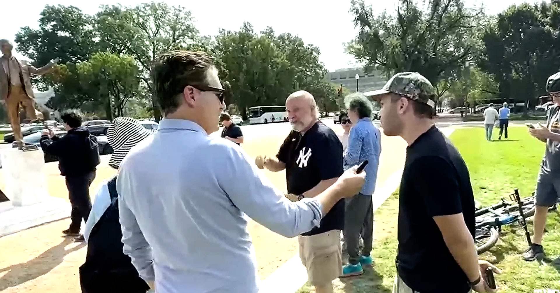 Trump Fan At Now-Removed Trump-Epstein Statue Says He Won’t Release File ‘Because He’s On It’