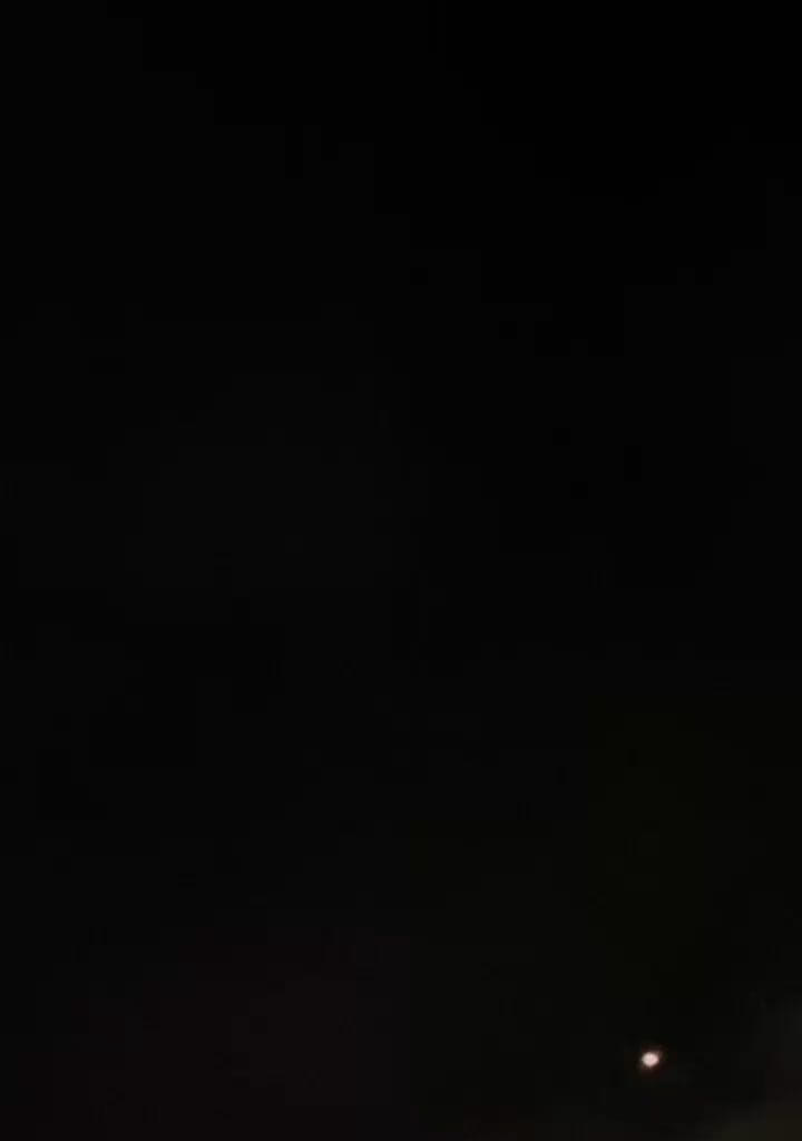 Was out walking and decided to film this plane and saw a weird green orb zoom off super quickly above it any ideas?